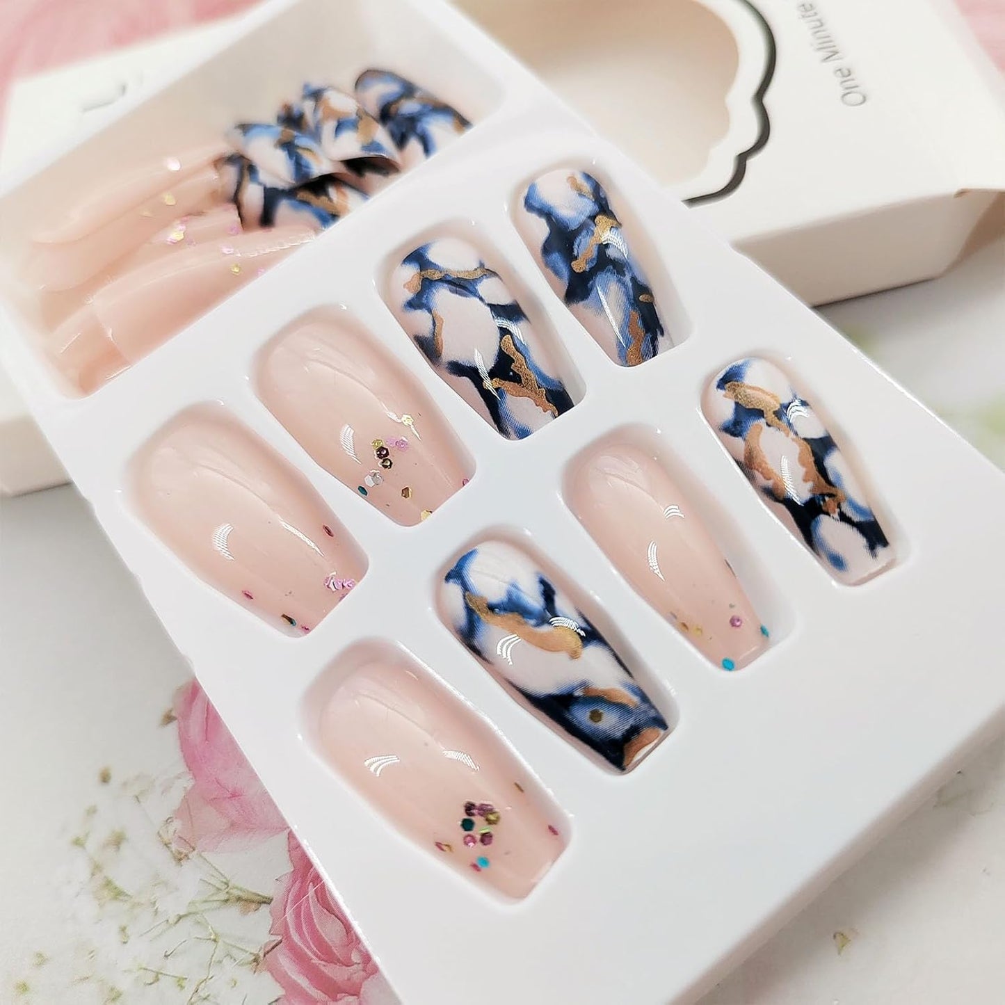 Coffin Press on Nails Medium Length Fake Nails Artificial False Nails with Blue Marble & Sequins Designs Glossy Acrylic Nails Nude Full Cover Glue on Nails for Women 24 Pcs